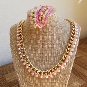 Goldtone necklace and bracelet set by Plunder.